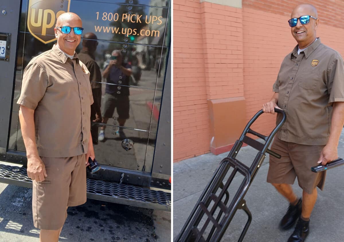 Alameda Post - Derrick Reynolds the UPS driver stands in uniform with his UPS truck and handcart and smiles