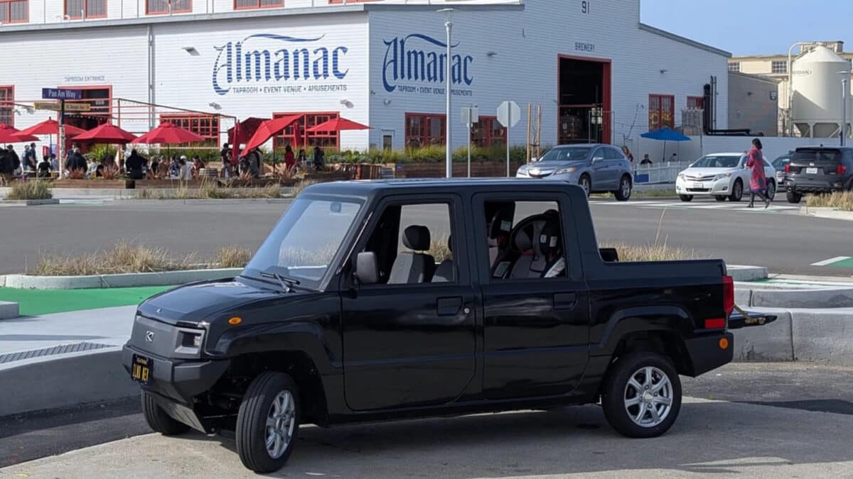 Alameda Post - a small vehicle that resembles a tiny truck in front of Almanac