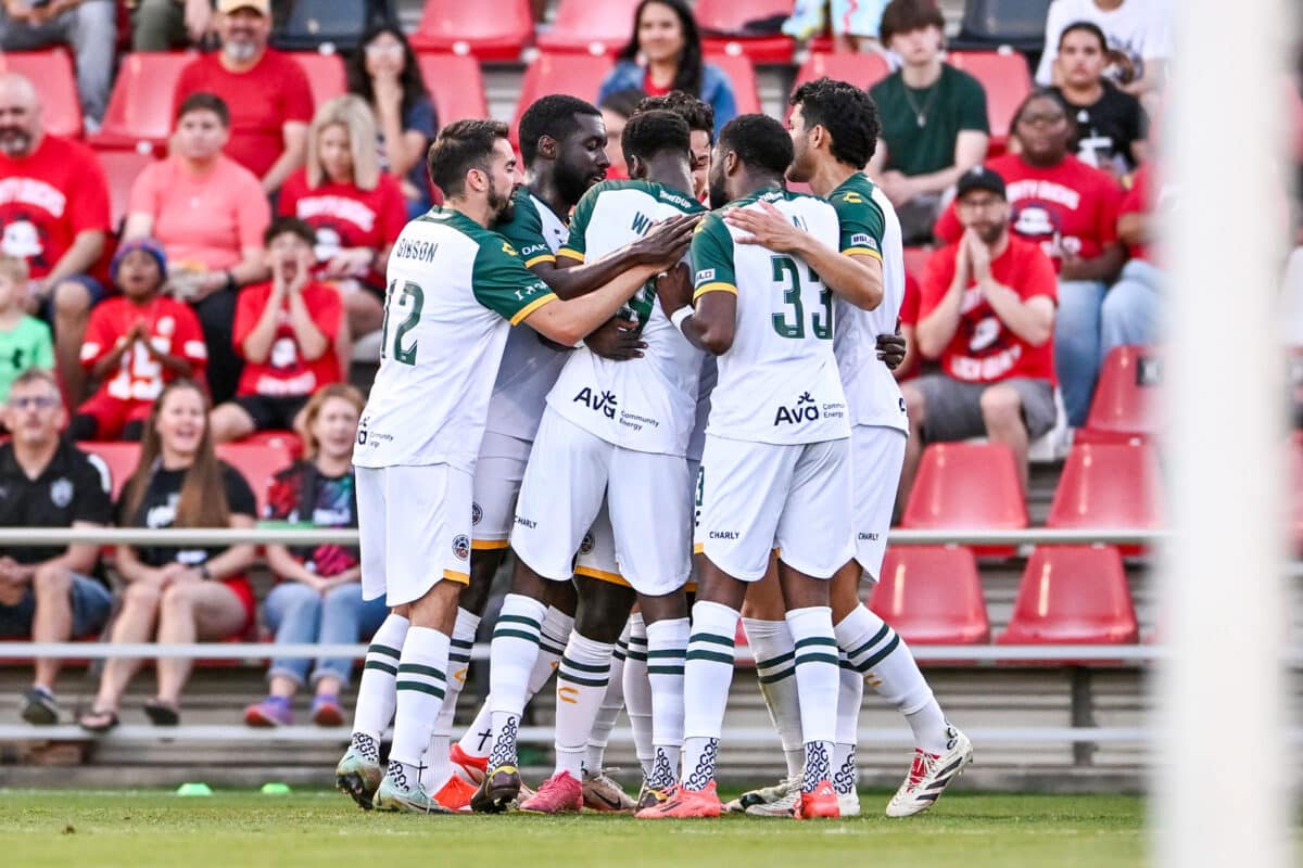 Alameda Post - the Oakland Roots team gathers together in a huddle in the match versus San Antonio FC