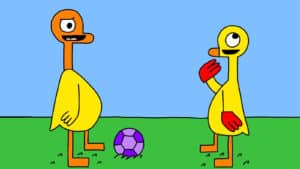 Alameda Post - two goslings stand and talk on a field near a soccer ball