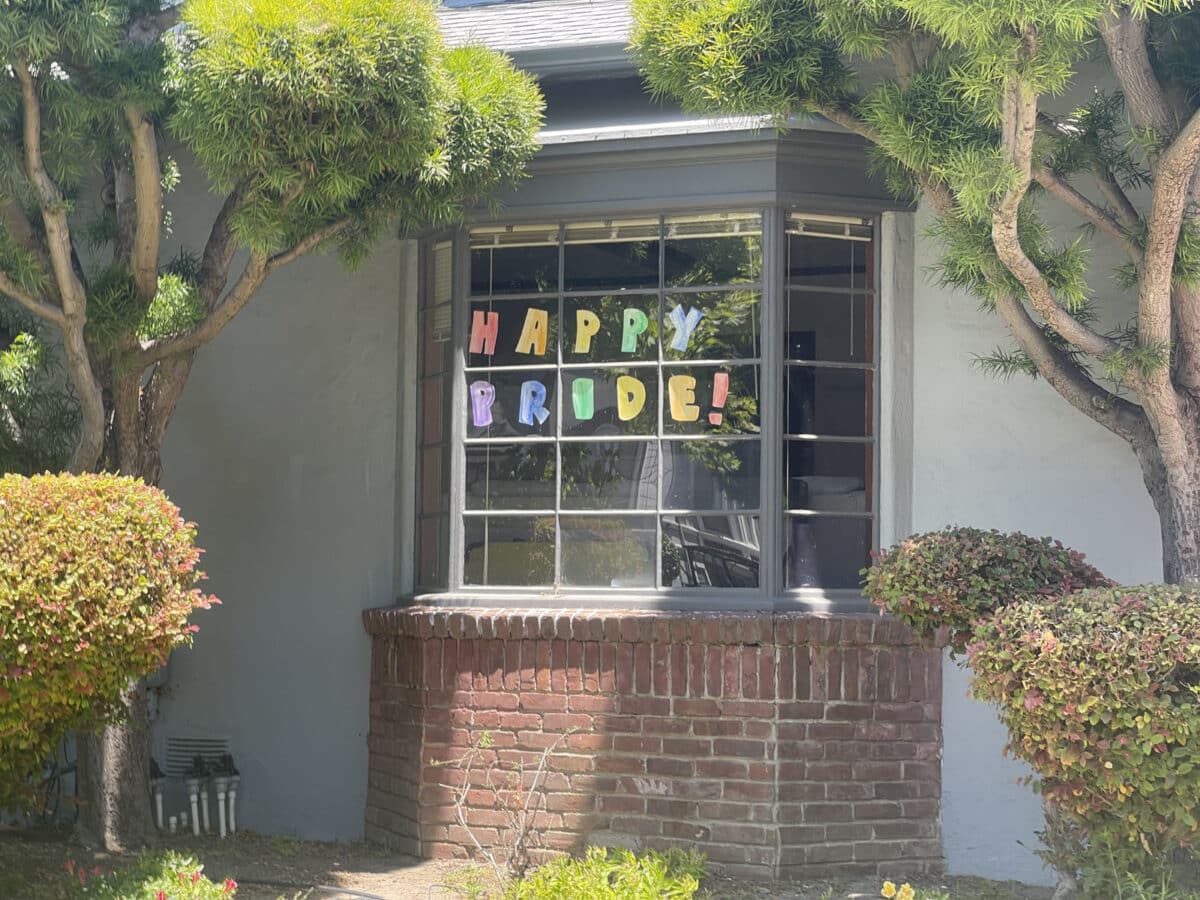 Alameda Post - a window display that says "Happy Pride"
