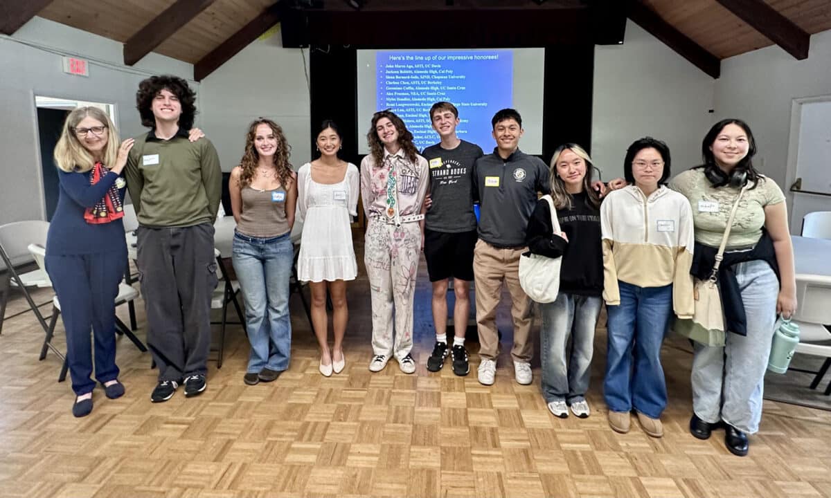 Alameda Post - students pose with the president of the Rotary Club after receiving scholarships