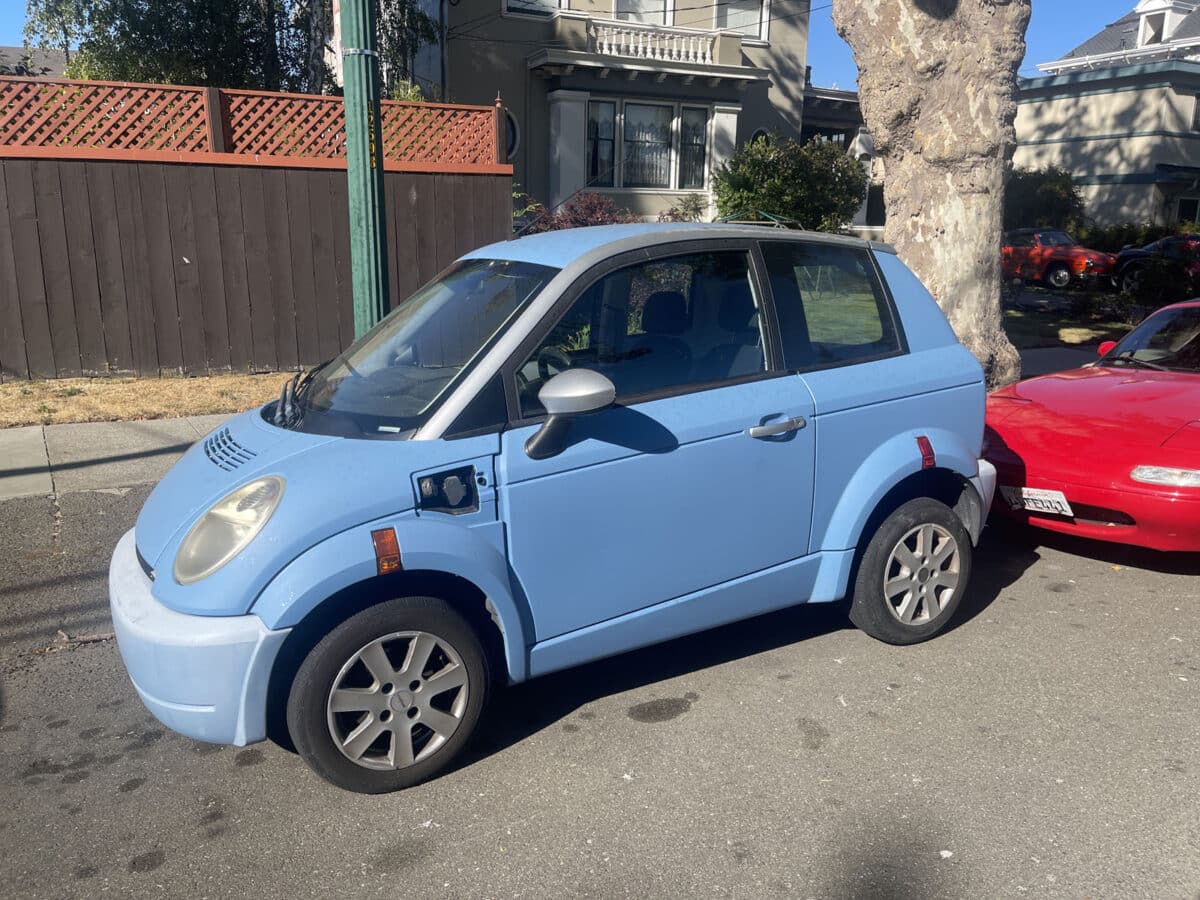 Alameda Post - a very small blue car