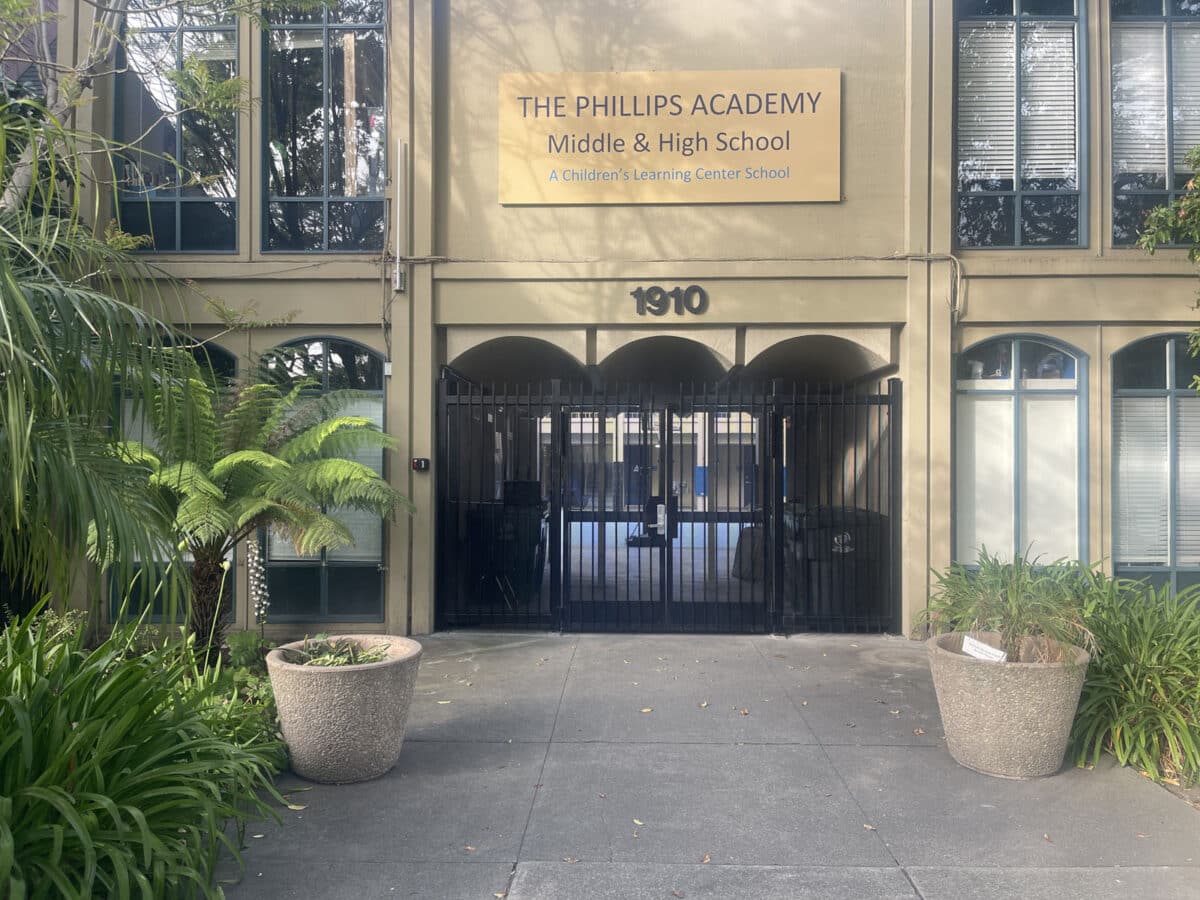 Alameda Post - the front of The Phillips Academy, now with a large metal gate