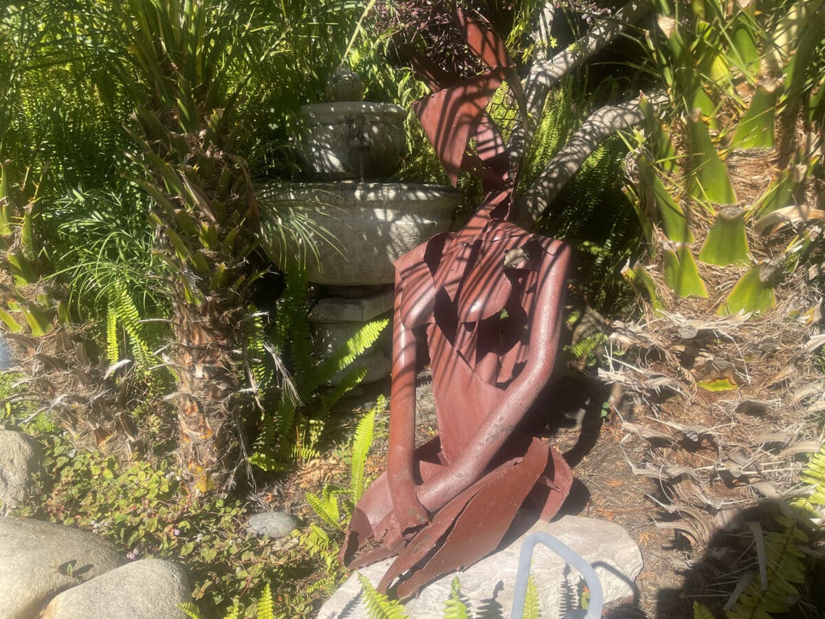 Alameda Post - a sculpture of a woman