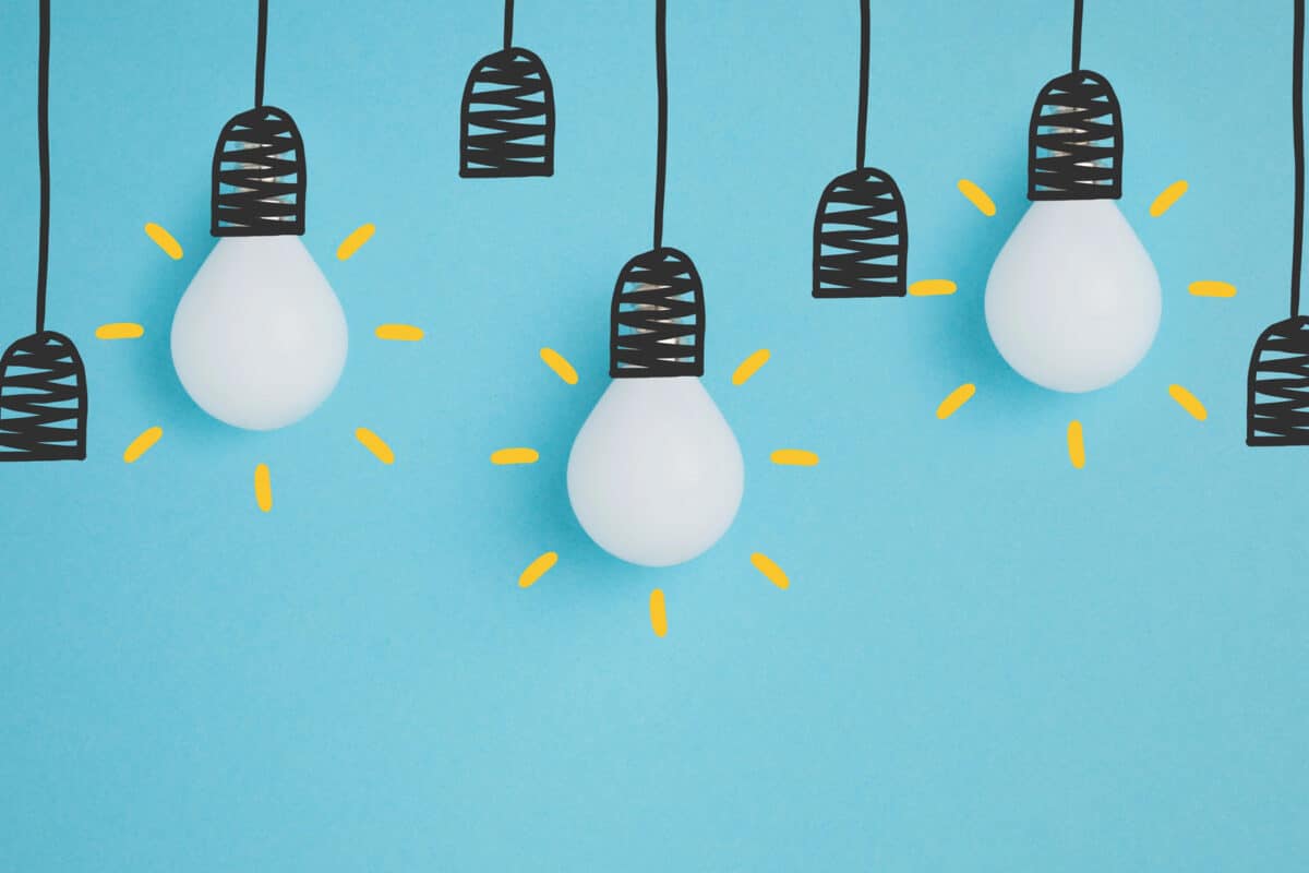 Alameda Post - an image of lightbulbs lit up with electricity. It's a whimsical drawing