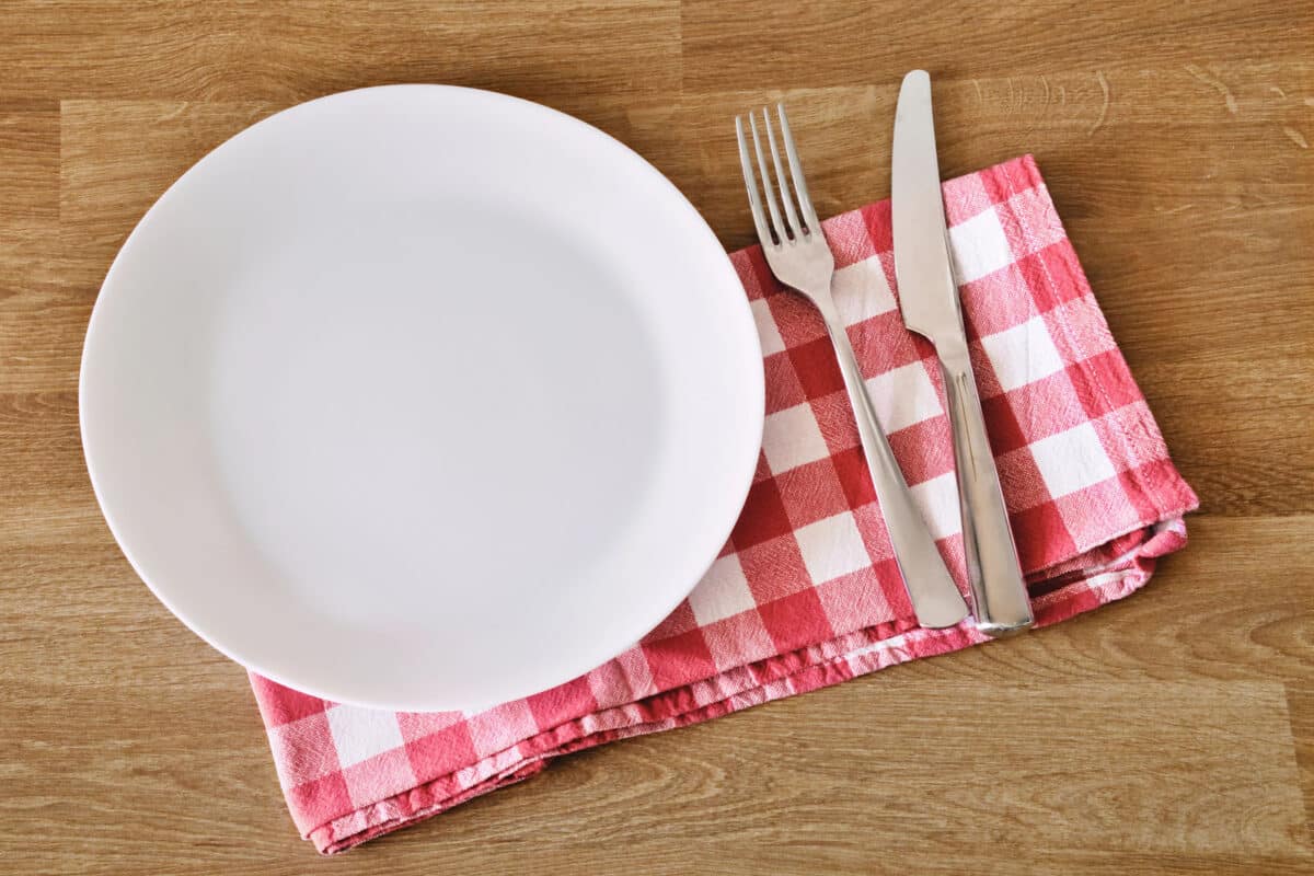 Alameda Post - a place setting for a luncheon