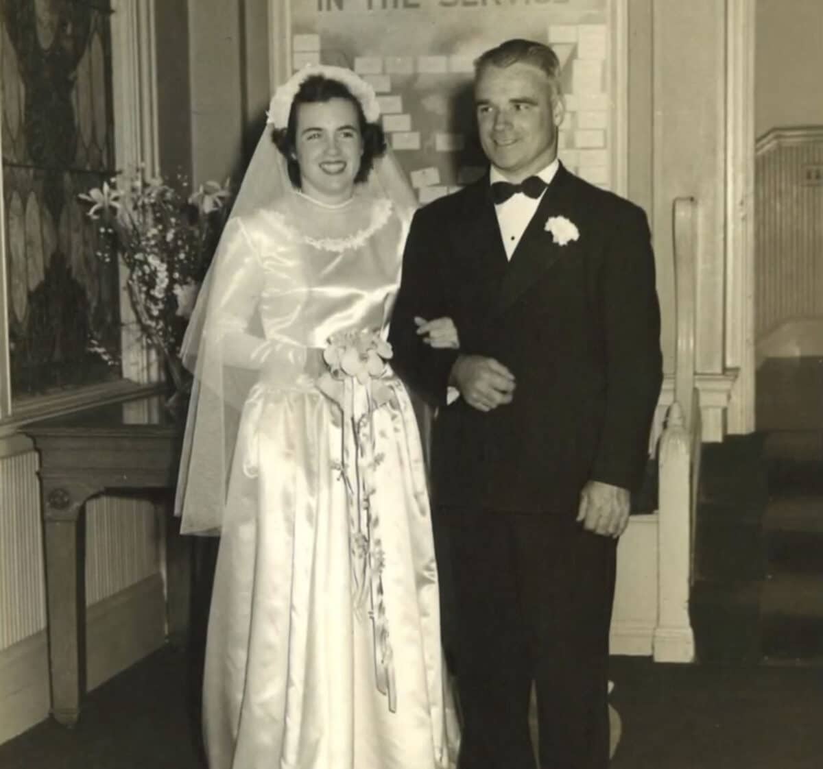 Alameda Post - a black and white photo of a bride and her father