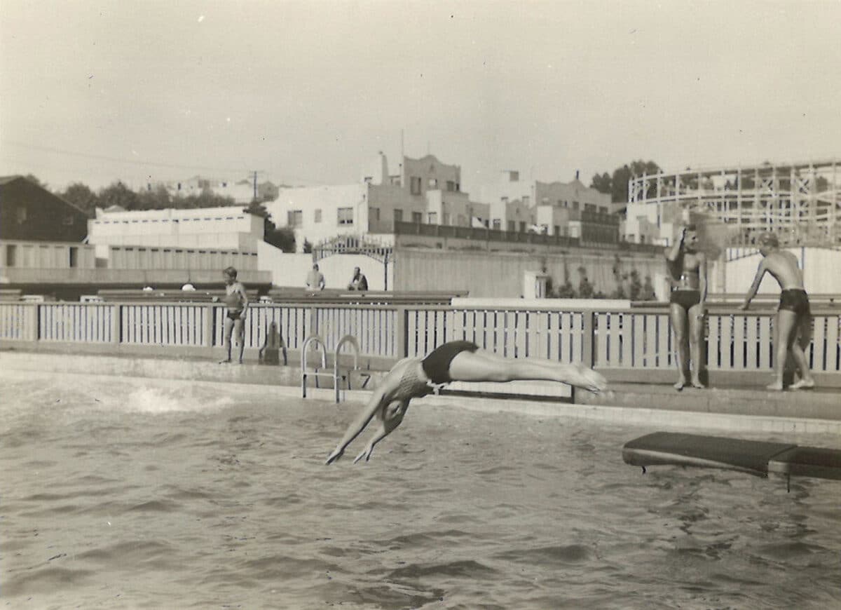 Alameda Post - in a n old photo, a woman dives off of a diving board