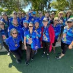 Alameda Post - a group photo of the DragonFlyers team wearing uniforms and medals around their necks