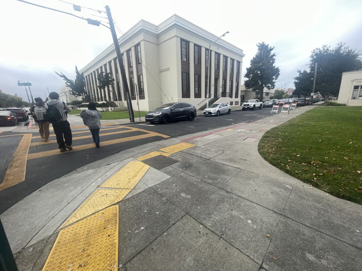 Alameda Post - pedestrian and car traffic in front of AHS