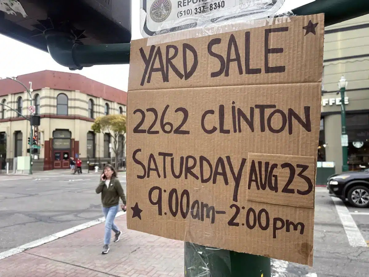 Alameda Post - A sign announcing a yard sale