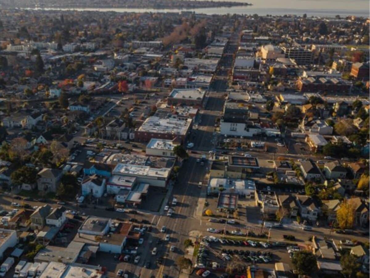 Alameda Post - an aerial view of Alameda with Bay Farm Island. in the background.