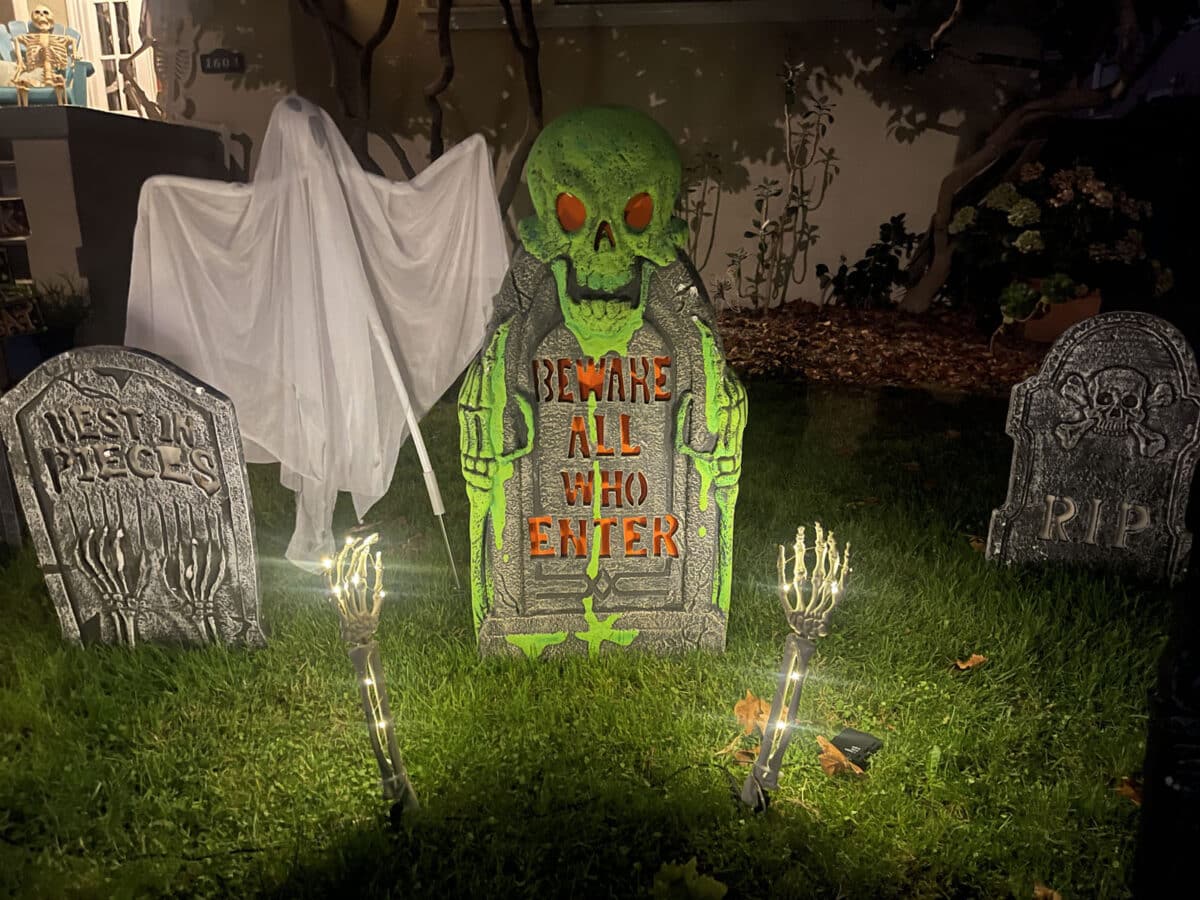 Alameda Post - Halloween decor in a yard. It's a spooky graveyard.