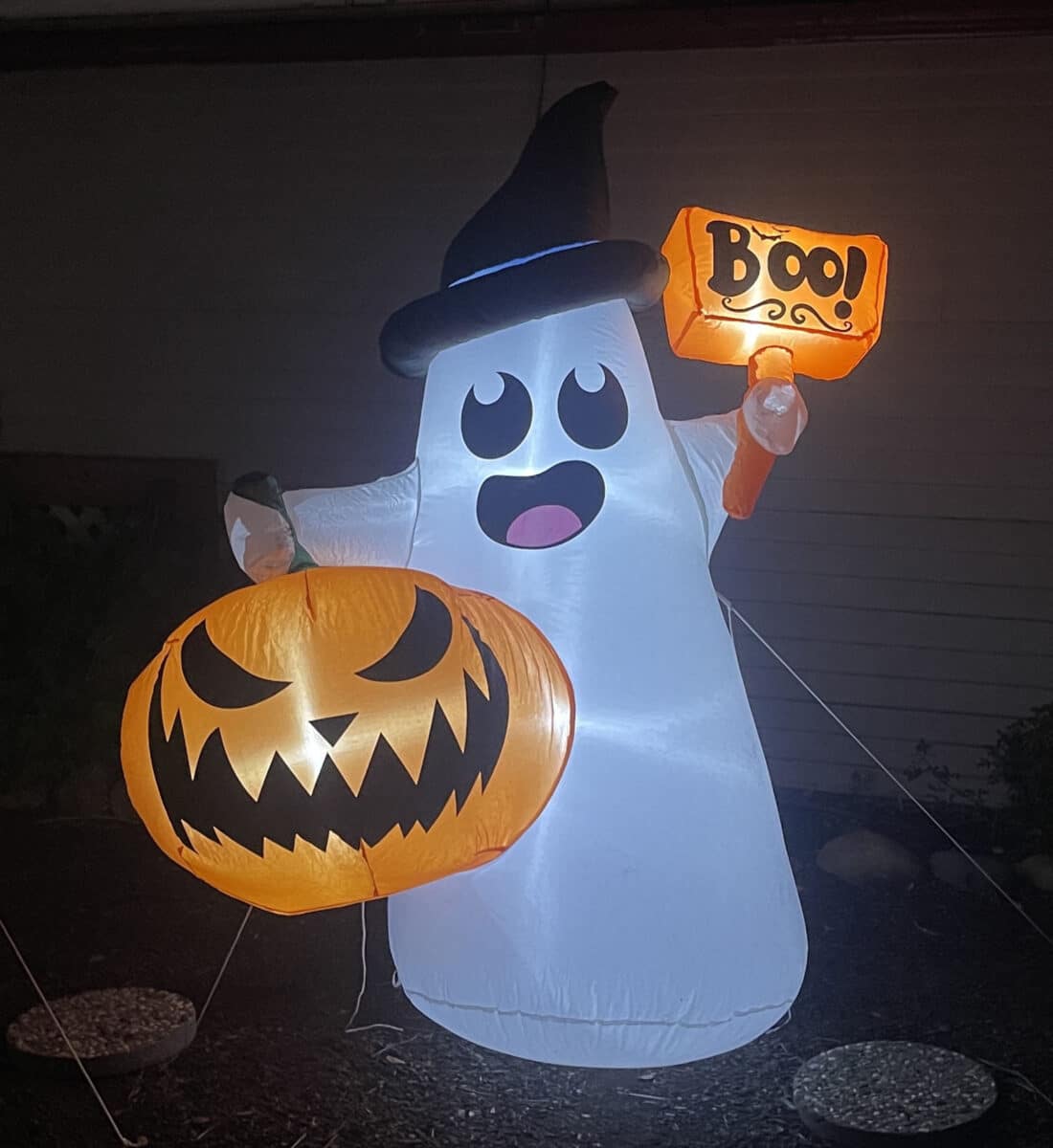 Alameda Post - Halloween decor in a yard. It's a friendly ghost with a sign that says Boo.