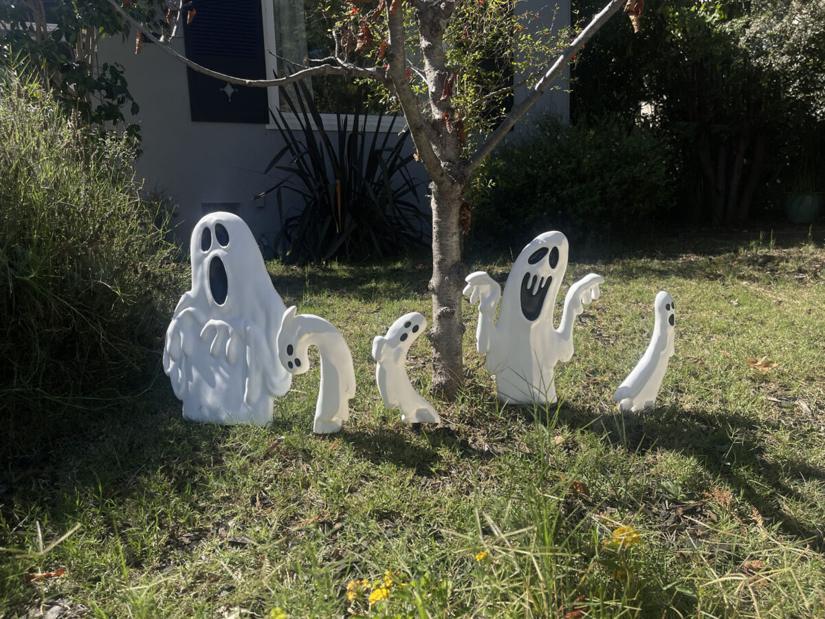 Alameda Post - Halloween decor in a yard. It's a family of ghosts.