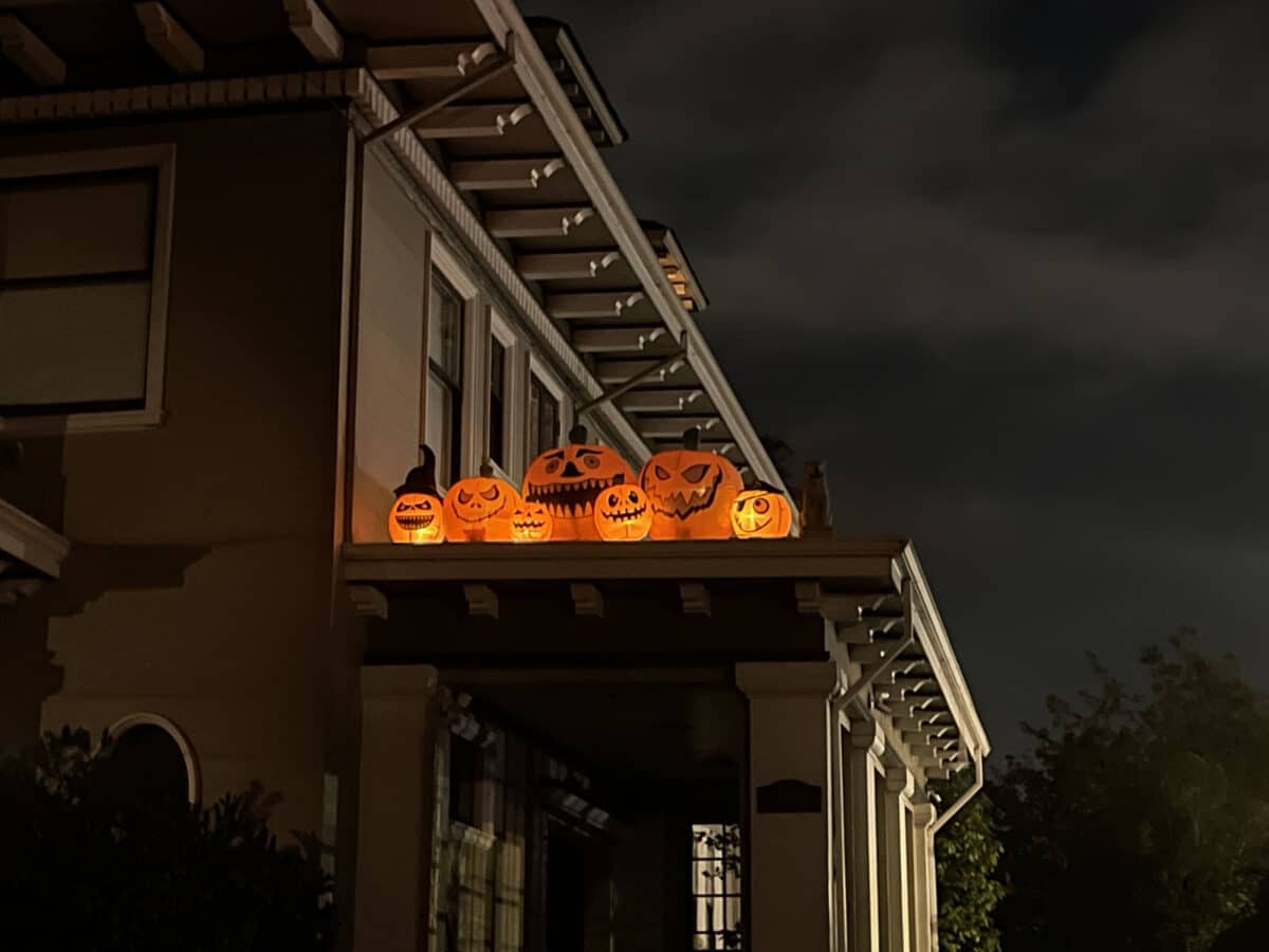 Alameda Post - Smiling, light up, blow up jack o lanterns on an awning.