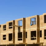 Alameda Post - Wooden frames of house apartment construction site using lumber