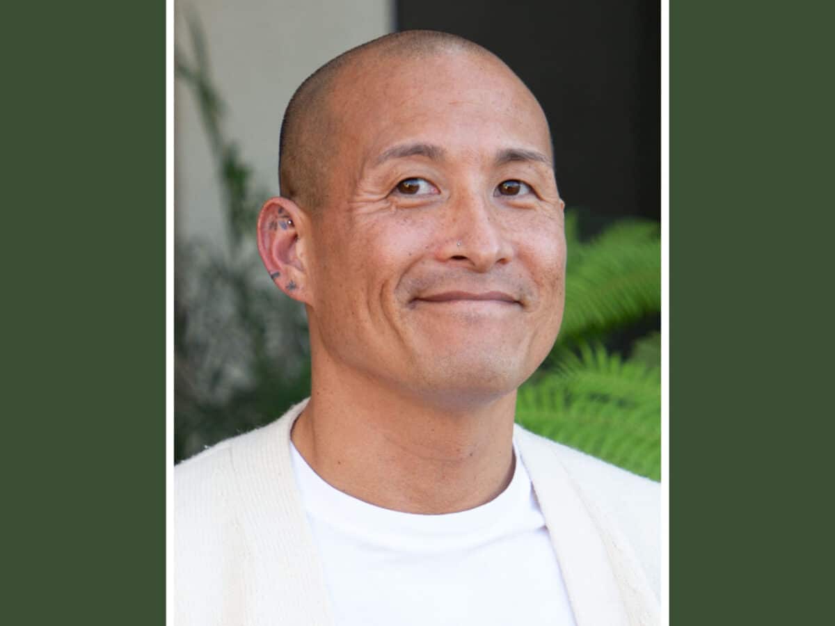 Alameda Post - Michael Kramer Wong smiles in a headshot photo.
