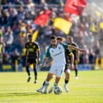 Alameda Post - An Oakland Roots player dribbles the ball against New Mexico United.