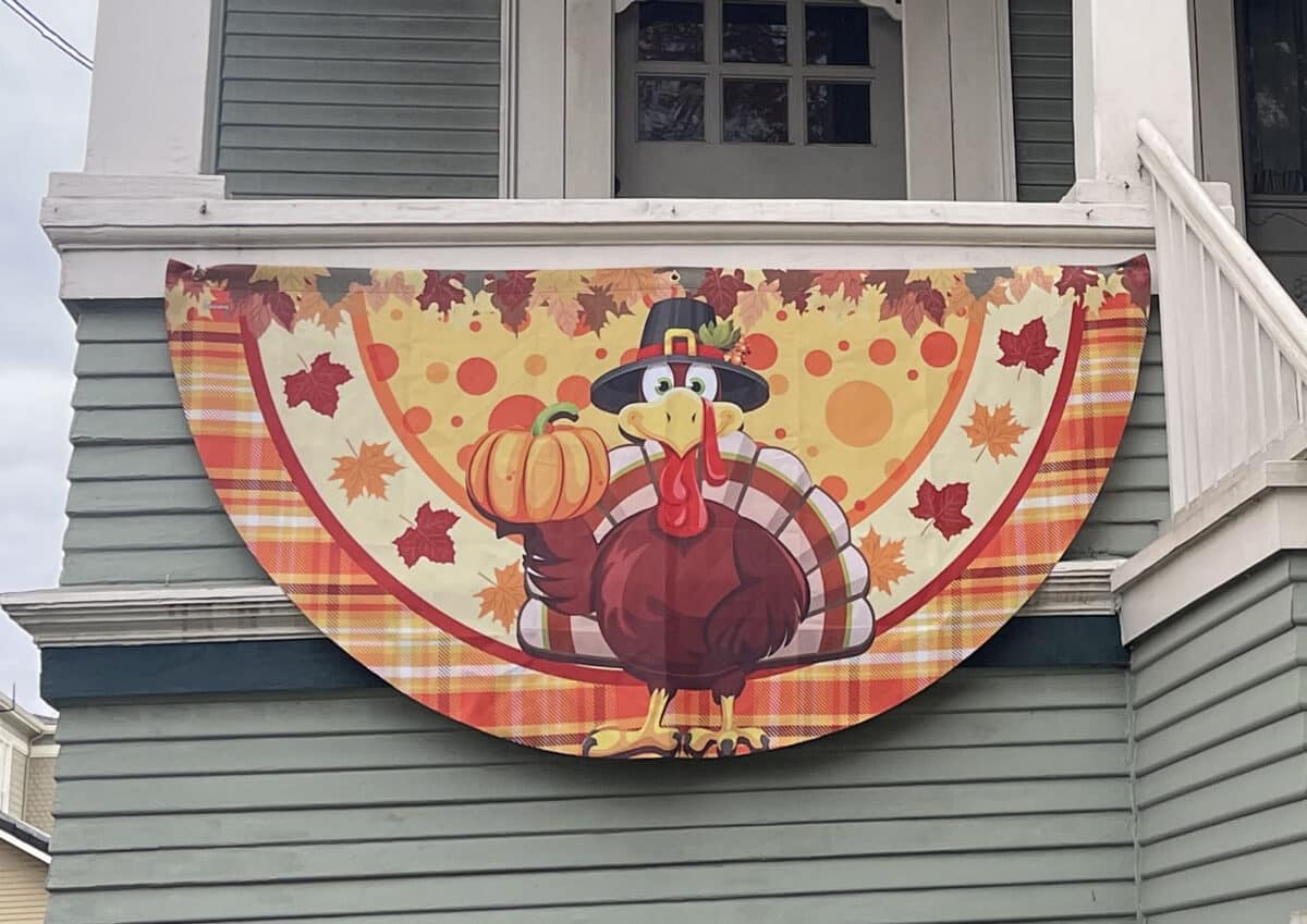 Alameda Post - A half circle flag with a turkey on it.