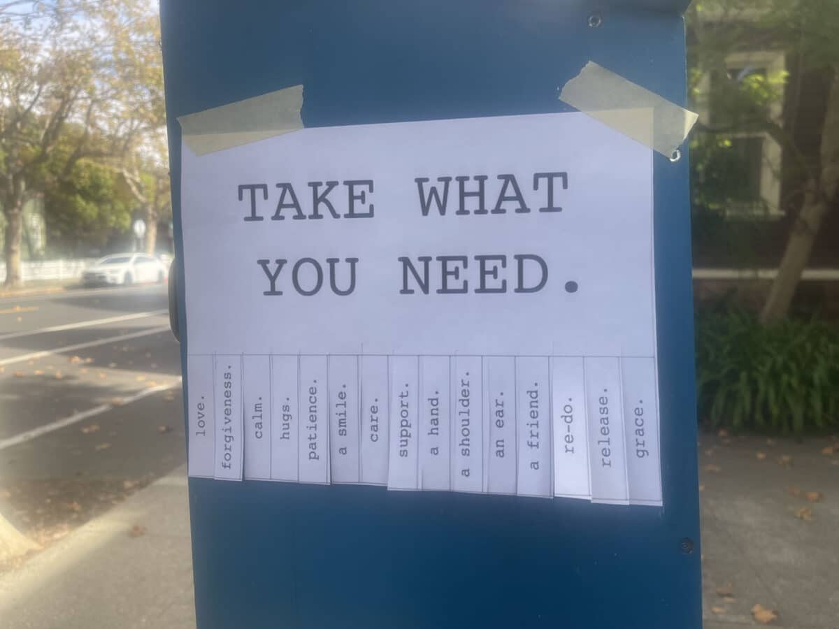 Alameda Post - A piece of paper with little tabs on it. The paper says "Take what you need" and the tabs say things like love, forgiveness, a friend, and grace. 