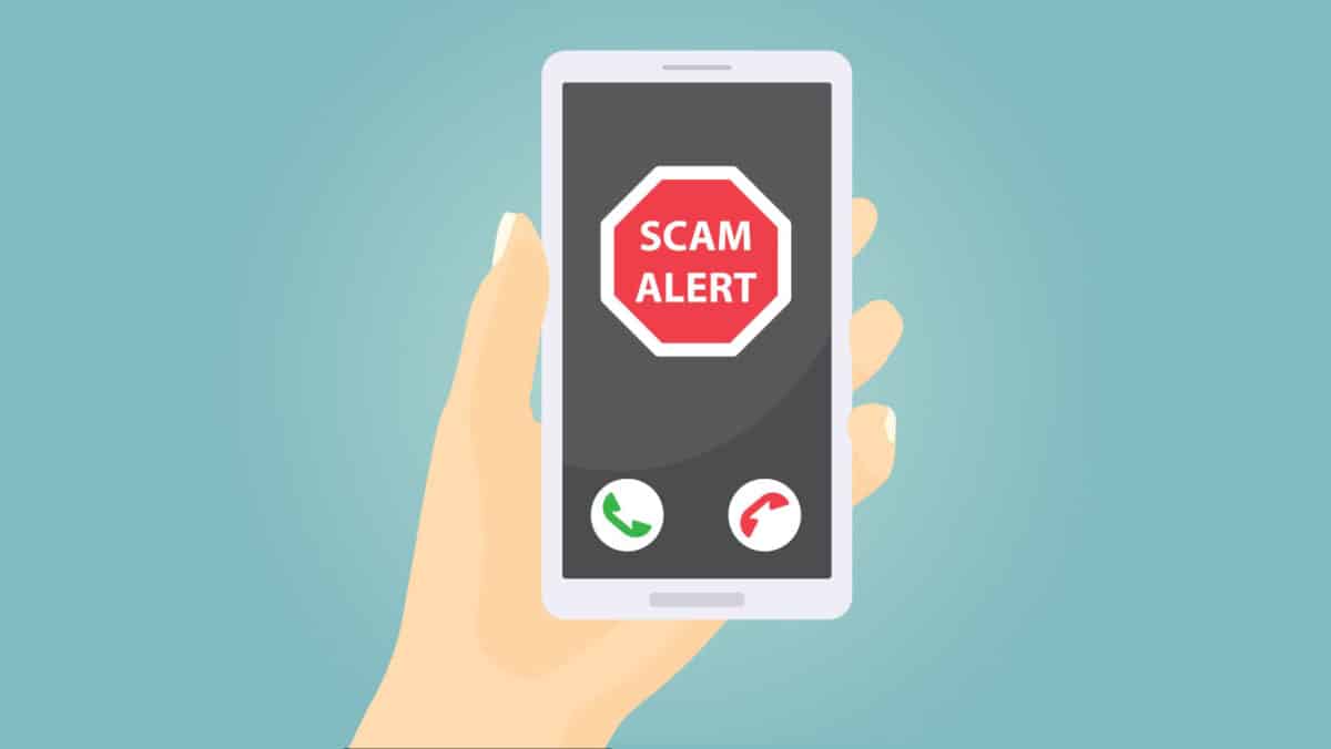 Alameda Post - A drawing of a hand holding a phone that says "Scam Alert."
