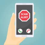 Alameda Post - A drawing of a hand holding a phone that says "Scam Alert."