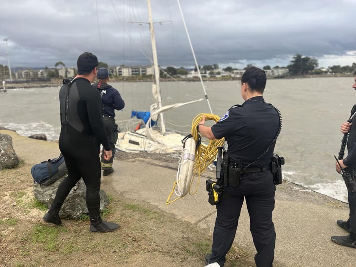 Alameda Post - Emergency personnel gather need a vessel taking on water in the Oakland Alameda Estuary.