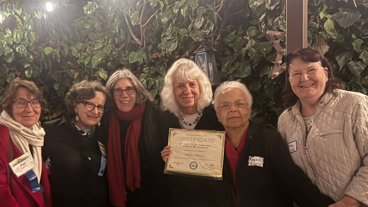Alameda Post - A group of six women smile, pose together, and hold a certificate.