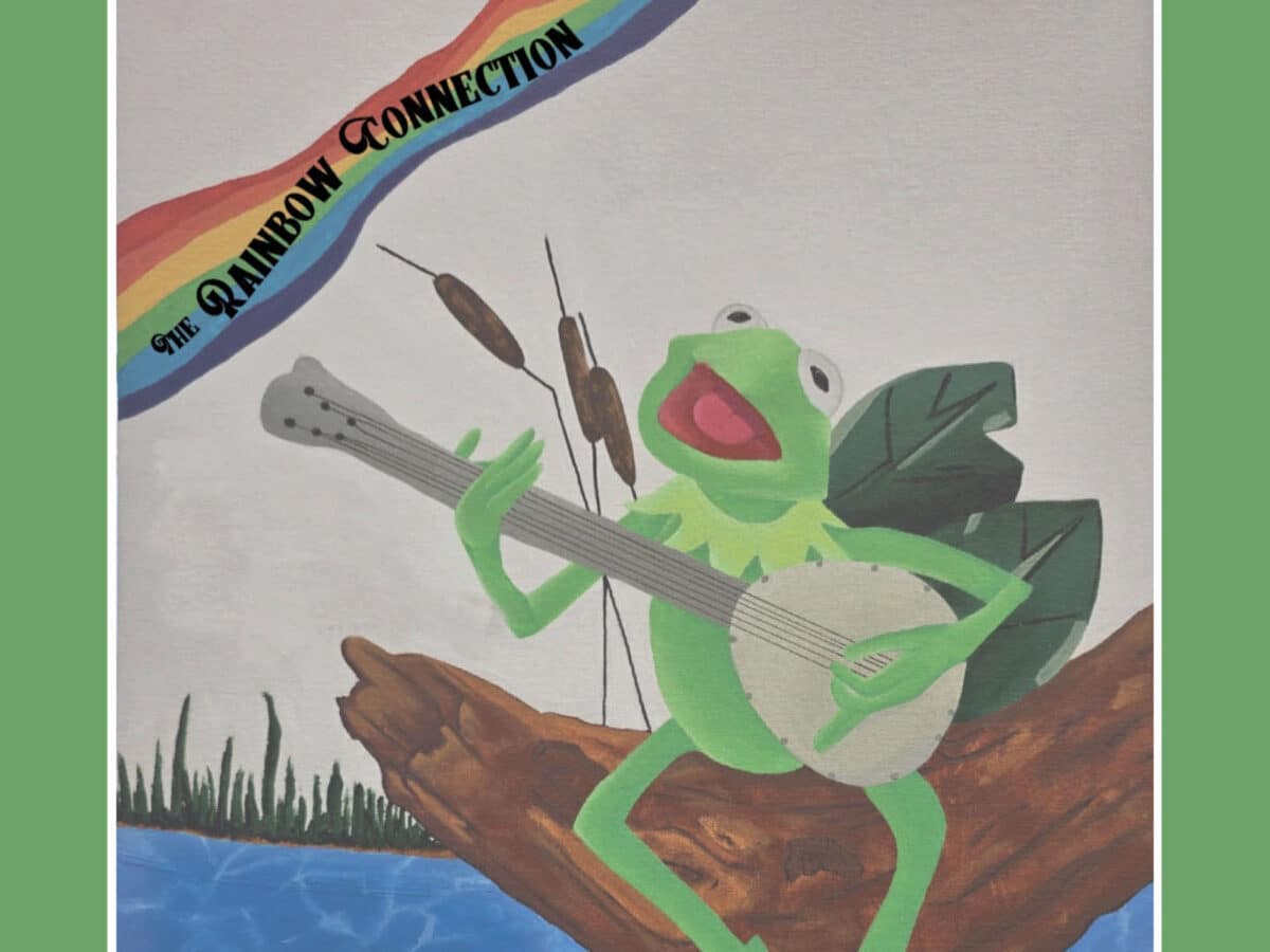 Alameda Post - A drawing of a frog playing a stringed instrument and text that says "The Rainbow Connection.