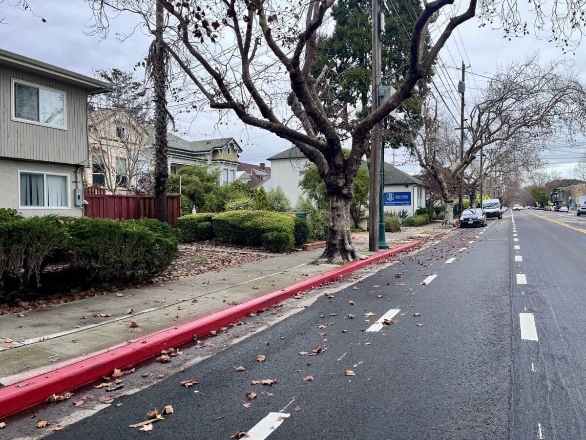 Alameda Post - A long strip of red curb. 
