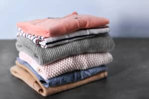 Alameda Post - A stack of folded laundry.
