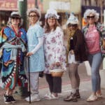 Alameda Post - Five women dressed up in Grandma outfits for GrannyCon stand at the corner of Park and Central.