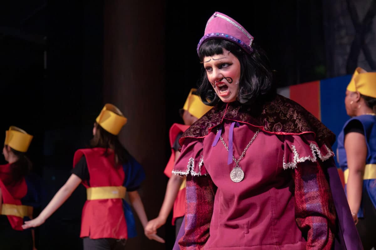 Alameda Post - An Encinal Junior and Senior High student in costume as Lord Farquad, performing onstage.