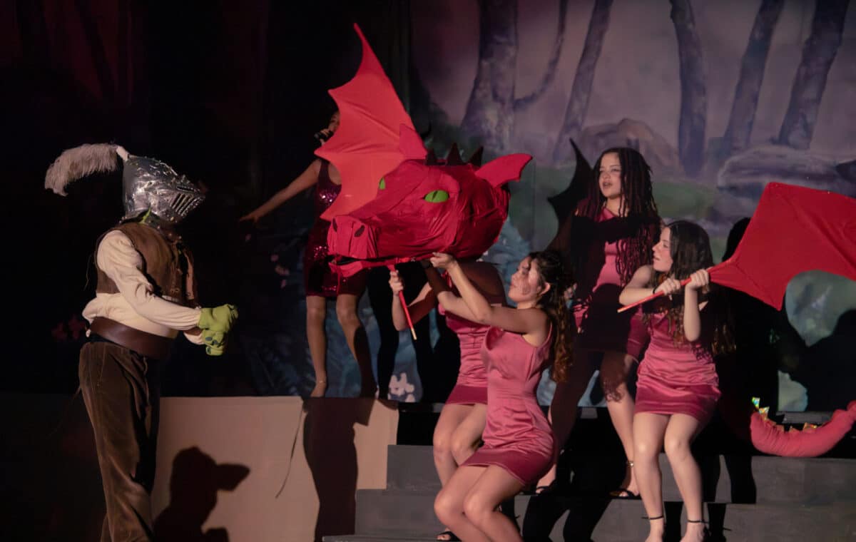 Alameda Post - An ensemble plays the dragon in Shrek, similar to how multiple people would perform as a Chinese dragon.