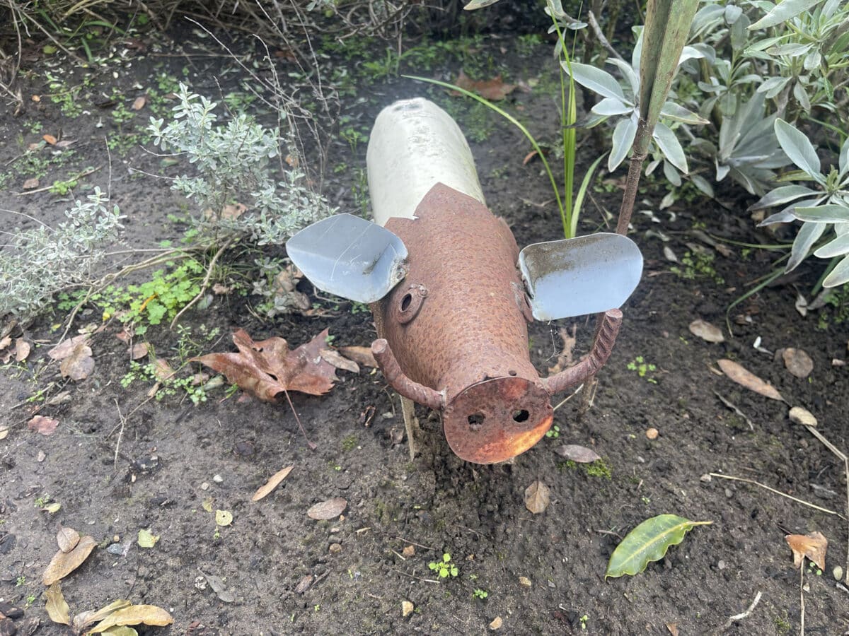 Alameda Post - A metal statue of a boar. 