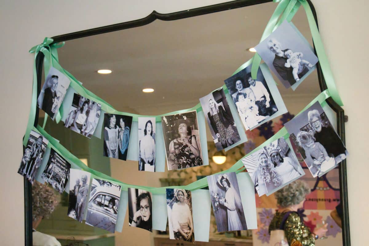 Alameda Post - A collection of black and white photos of women in previous generations. They hold babies, wear wedding dresses, and smile with family. 