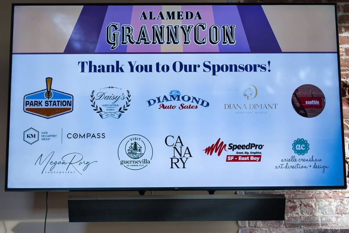 Alameda Post - A TV screen that says "Thank you to our sponsors" for Alameda GrannyCon.