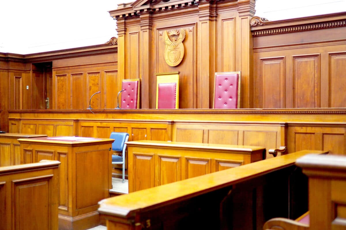 Alameda Post - A courtroom with wood paneling. 