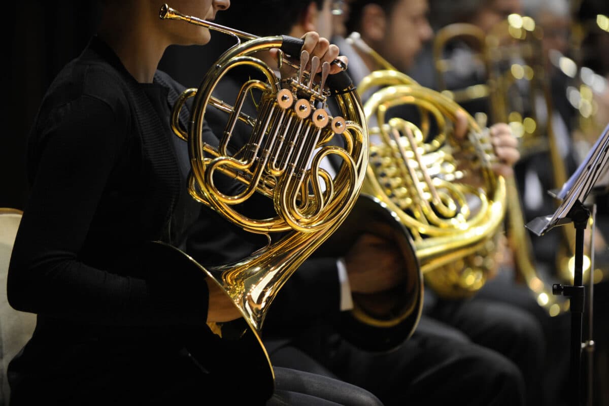 Alameda Post - French horn players and their instruments.