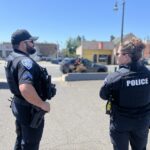Alameda Post - Two police officers converse.