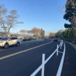 Alameda Post - A newly remodeled Aughinbaugh Way featuring plastic posts separating a bike lane.