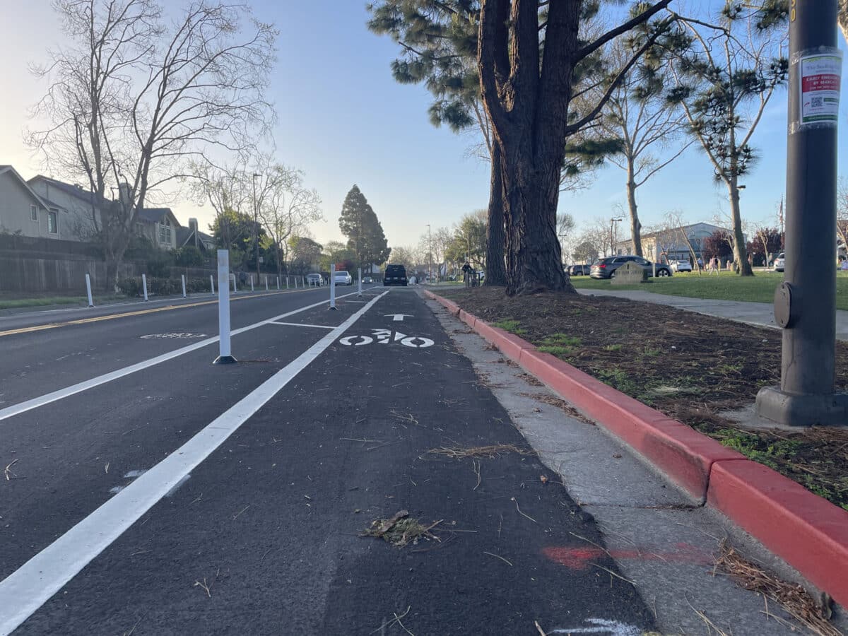 Alameda Post - A bike lane with plastic posts between it and the road.