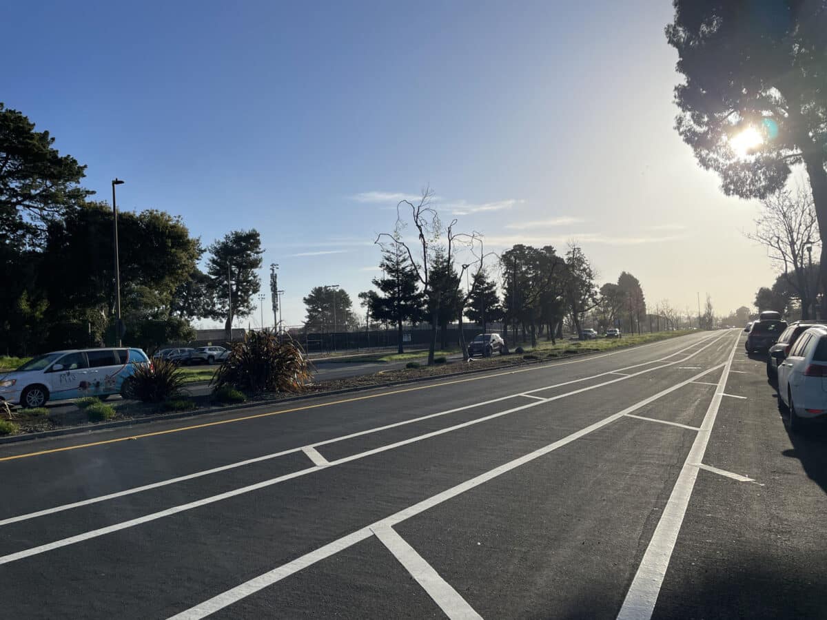 Alameda Post - Mecartney Road with new improvements including one travel lane, a buffered bike lane, and a wider parking lane. 
