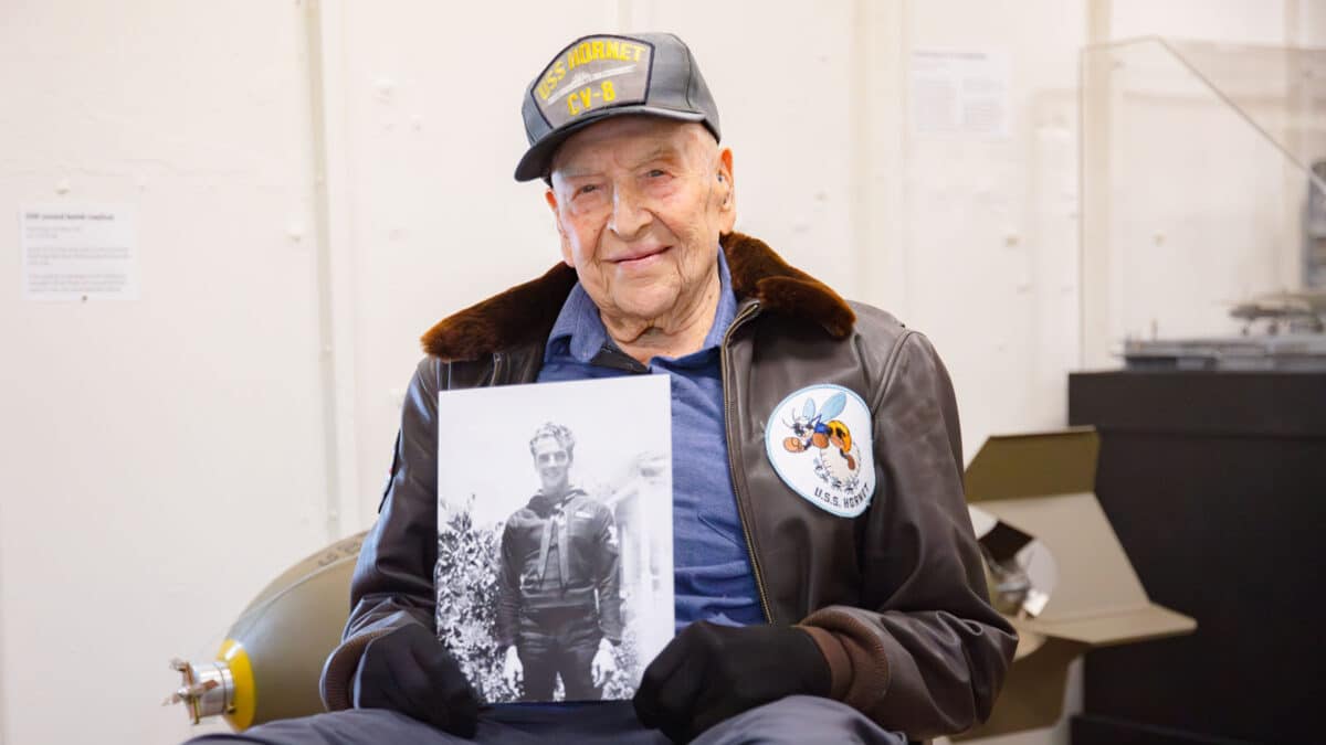 Alameda Post - Alfred J. Payne holds a photo of his much younger self.