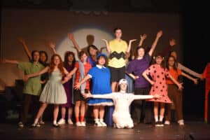 Alameda Post - A group photo of the Cast For You're a Good Man Charlie Brown onstage in costume.