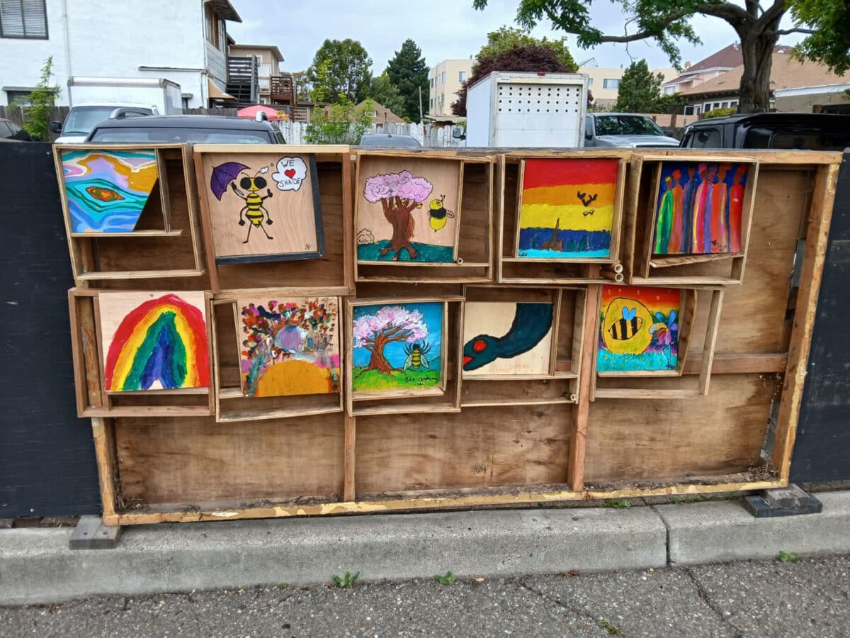 Alameda Post - A gallery wall in Webster Park of small artworks. 