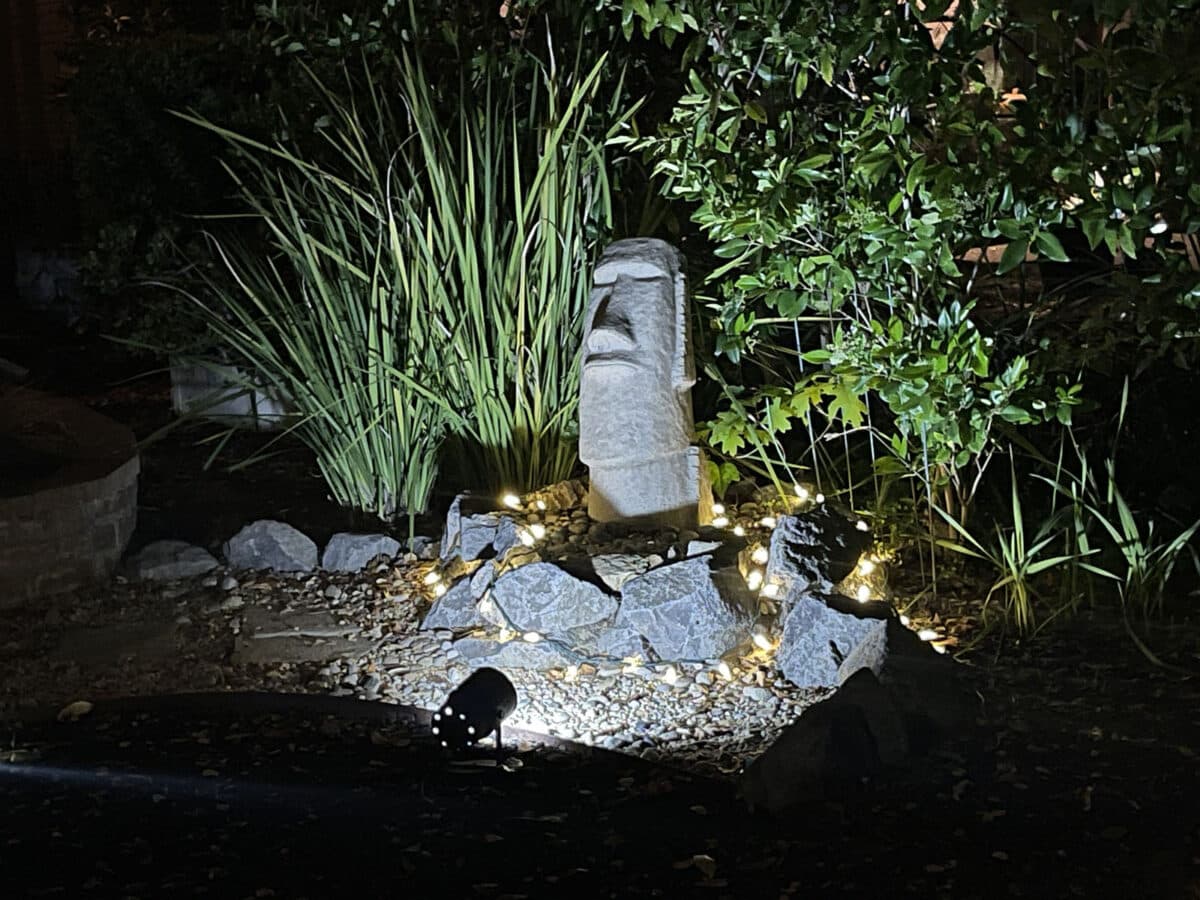 Alameda Post - A yard decoration that looks like an Easter island head.