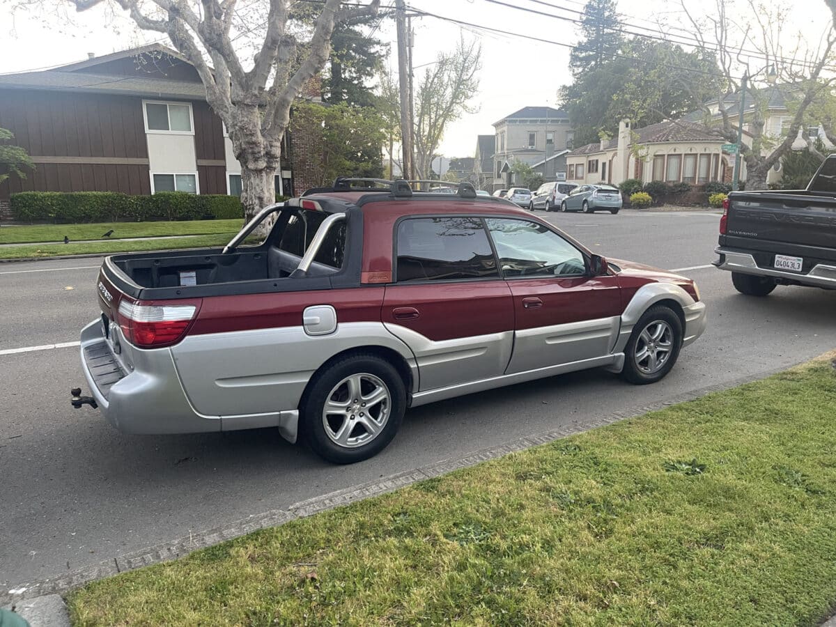 Alameda Post - A subaru Baja, which has a small truck bed on a car.